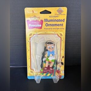 VTG 1999 Walt Disney Classics EZ Light Illuminated Ornament Pinocchio Lot Of 2
